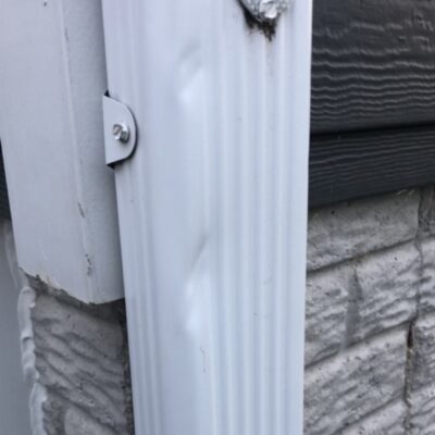 Damaged Gutter Downspout